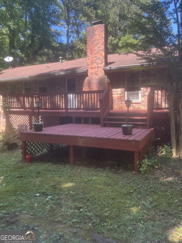 back of property with a deck