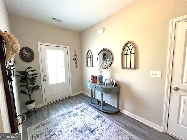 entrance foyer featuring hardwood / wood-style floors