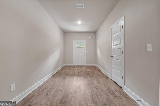 entryway with light hardwood / wood-style floors