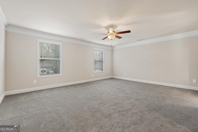 unfurnished room featuring crown molding, ceiling fan, and carpet