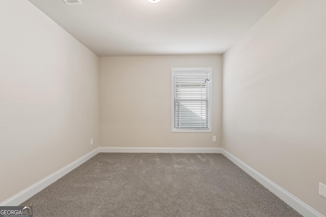 view of carpeted spare room