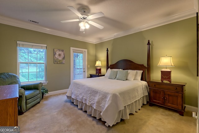 bedroom with light carpet, ceiling fan, and ornamental molding