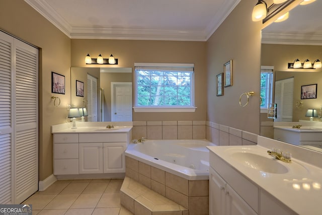 bathroom with double vanity, tile patterned flooring, crown molding, and a relaxing tiled tub