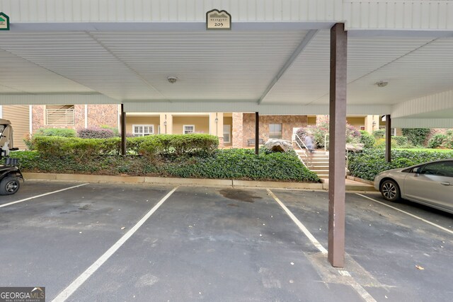 view of parking with a carport