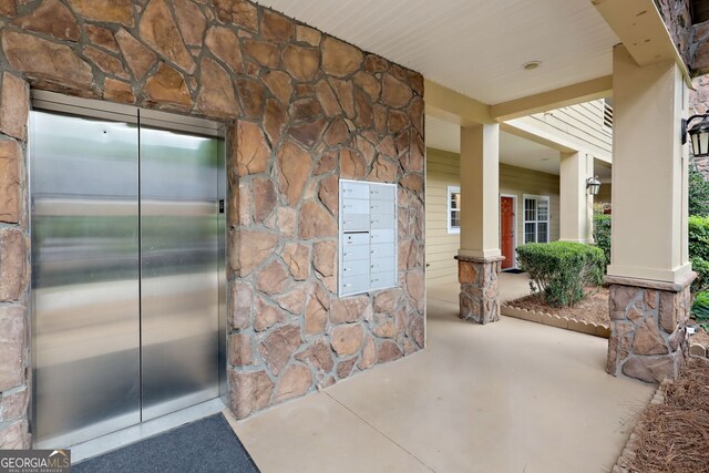 view of patio with elevator