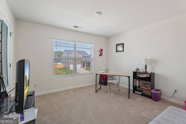 view of carpeted office space