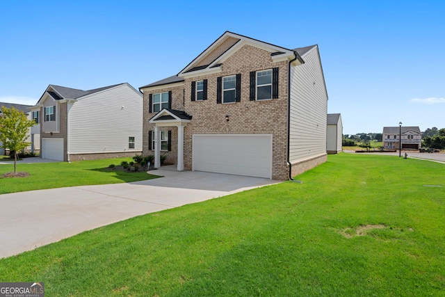 view of front of home with a garage and a front yard