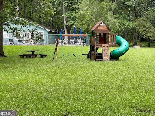 view of playground with a yard