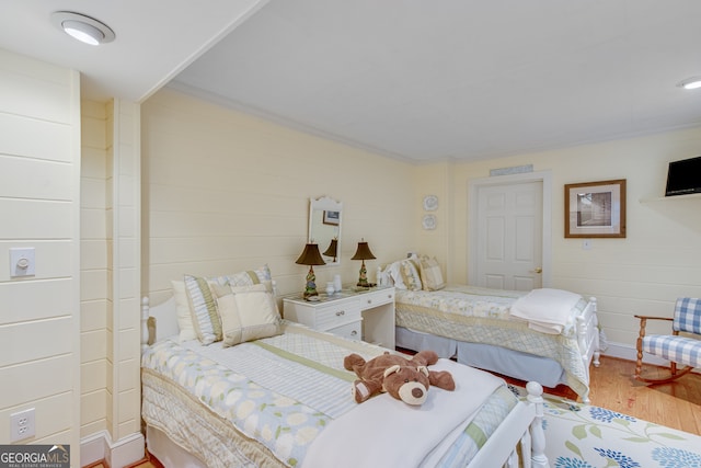 bedroom featuring wood-type flooring