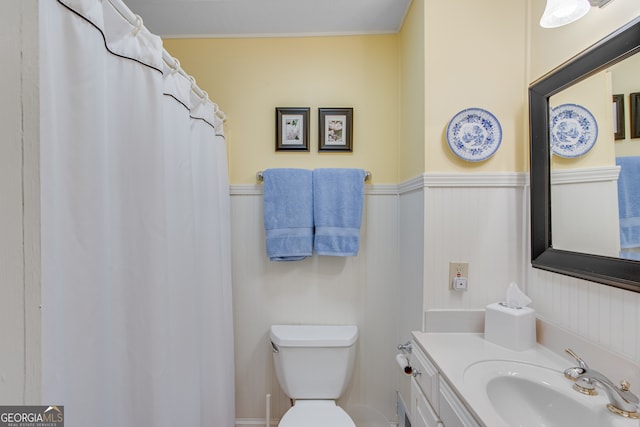 bathroom with vanity and toilet