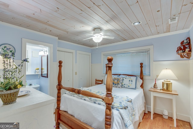 bedroom with ceiling fan, light hardwood / wood-style flooring, wooden ceiling, and ornamental molding