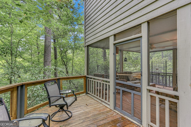 wooden terrace with a sunroom