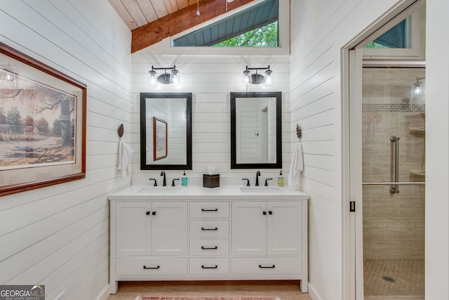 bathroom featuring walk in shower, vanity, wooden walls, lofted ceiling with beams, and wooden ceiling