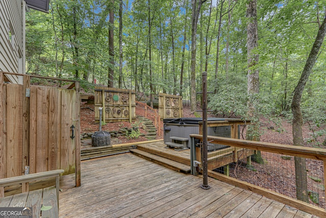 deck with a hot tub