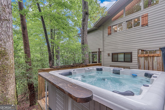 view of pool featuring a hot tub