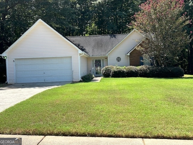 ranch-style house with a front yard and a garage