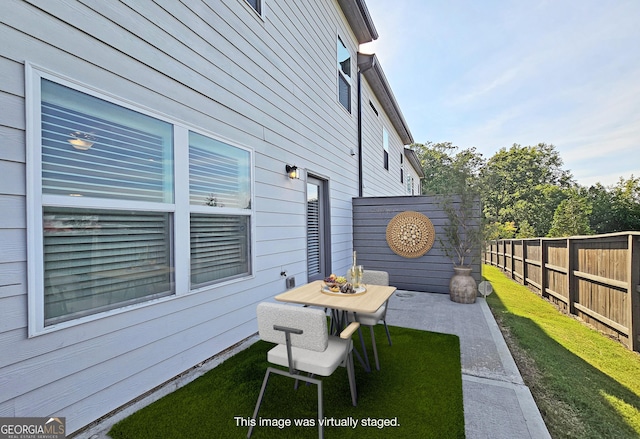 view of patio with fence