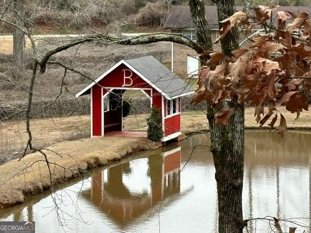 exterior space featuring a water view