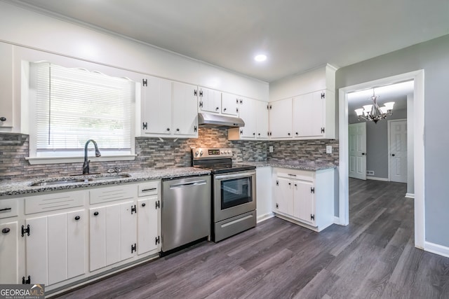 kitchen featuring sink, dishwasher, light stone countertops, dark hardwood / wood-style floors, and stove