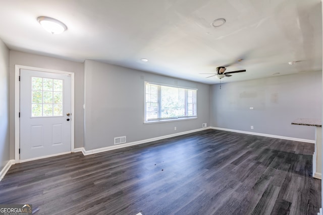 interior space featuring dark hardwood / wood-style floors and ceiling fan