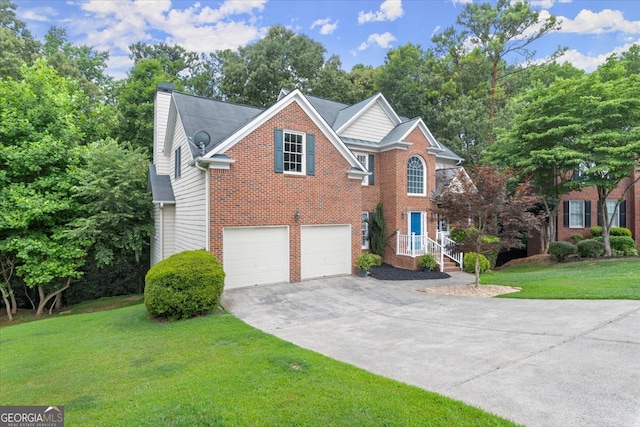 front facade featuring a garage and a front lawn