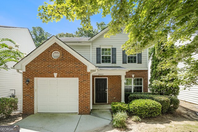 front of property featuring a garage