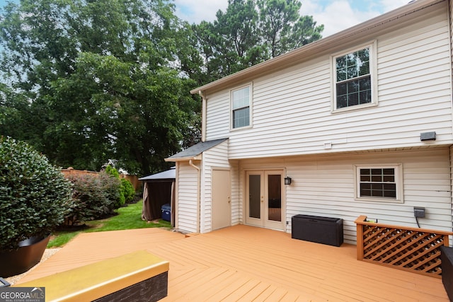 wooden deck featuring french doors