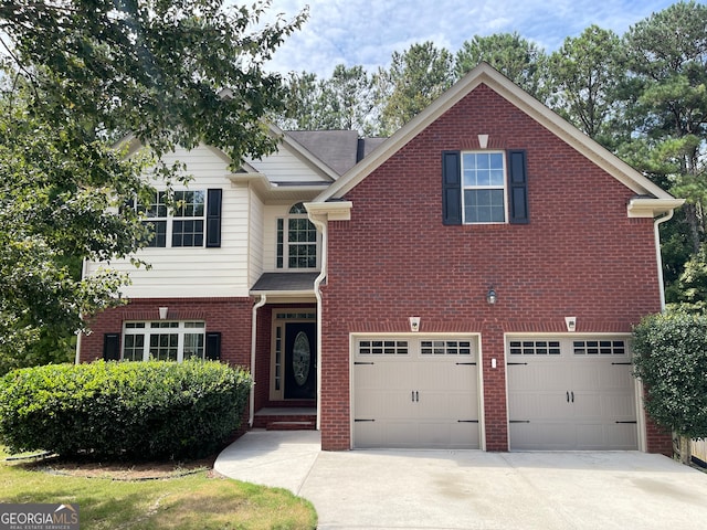 view of front of home with a garage