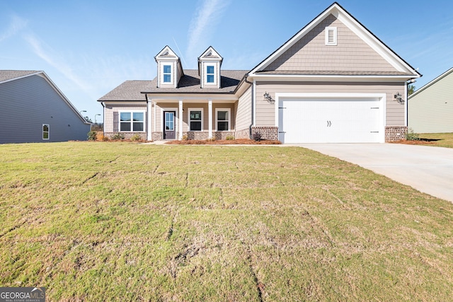 craftsman inspired home with a front yard and a garage