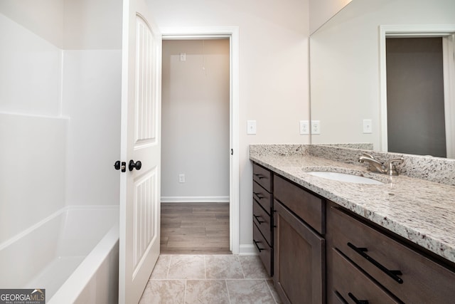 bathroom featuring hardwood / wood-style floors and vanity