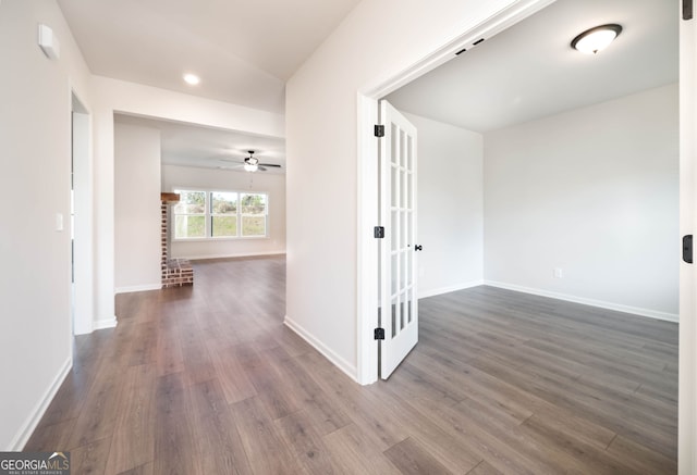 hall with dark hardwood / wood-style floors