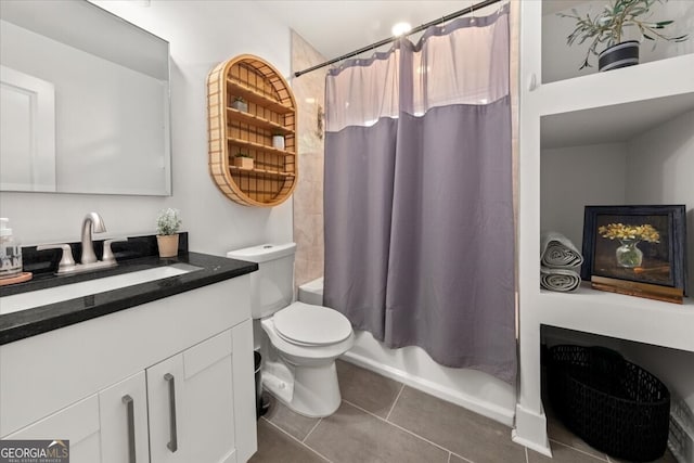 full bathroom featuring tile patterned flooring, toilet, shower / bath combination with curtain, and vanity