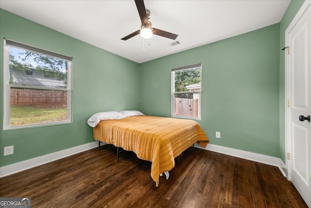 bedroom featuring wood-type flooring and ceiling fan