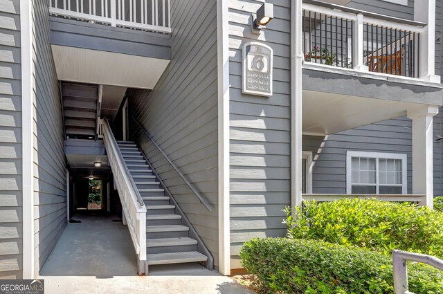 doorway to property featuring a balcony