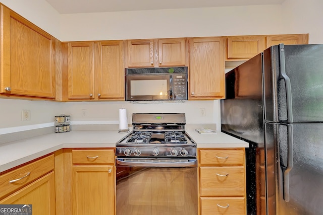 kitchen featuring black appliances