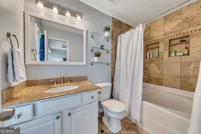 full bathroom featuring tile patterned floors, vanity, shower / bathtub combination with curtain, and toilet