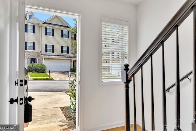 foyer with hardwood / wood-style flooring