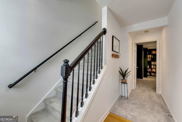 stairs with light carpet