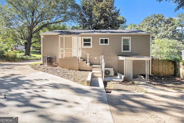 view of front of home featuring cooling unit