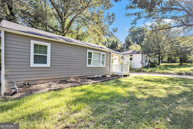 exterior space featuring a front lawn