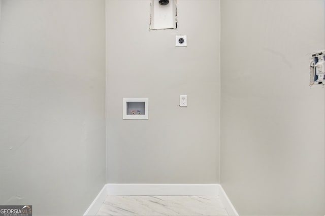 laundry room with electric dryer hookup, hookup for a washing machine, and tile patterned floors