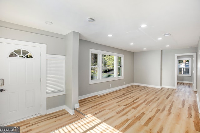 foyer entrance featuring light wood-type flooring