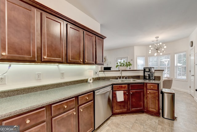 kitchen featuring hanging light fixtures, an inviting chandelier, sink, kitchen peninsula, and stainless steel dishwasher