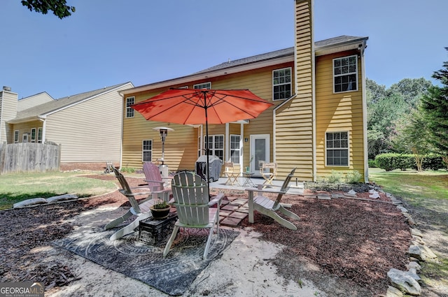 rear view of house featuring a patio