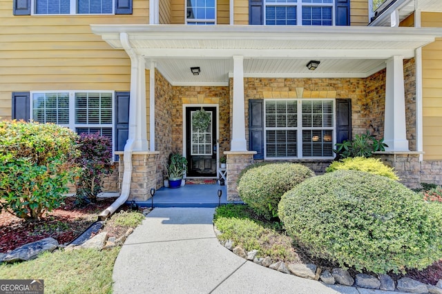 property entrance with a porch