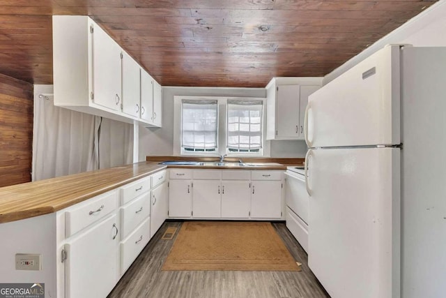 kitchen with white cabinetry, electric stove, white fridge, and wooden ceiling