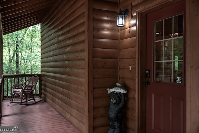 entrance to property featuring covered porch