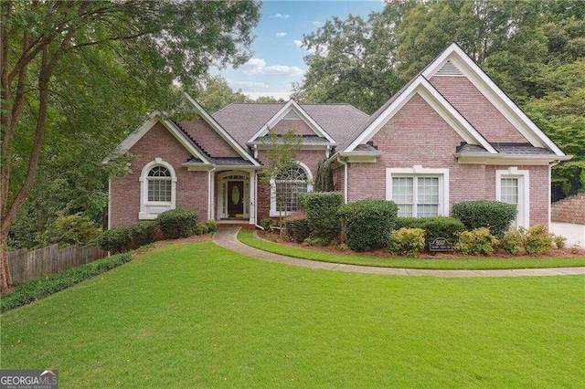 view of front of house with a front lawn