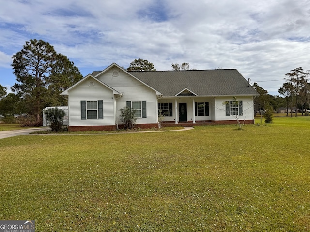 ranch-style home with a front yard