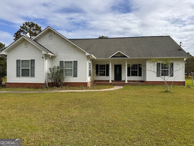 single story home featuring a front yard